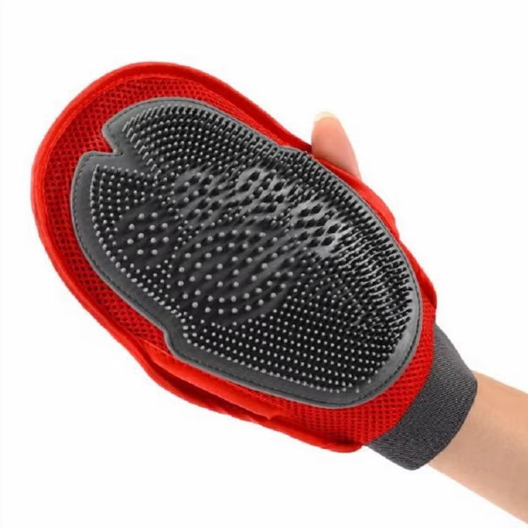 Close-up of a black dog grooming bath glove, a pet care tool for gentle massaging and cleaning.