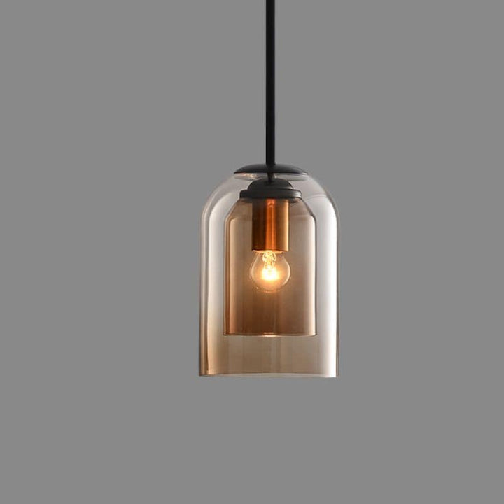 "Doppelglas-Pendelleuchte aus Rauchglas mit rostigem Finish, elegantes Design für moderne Inneneinrichtung."