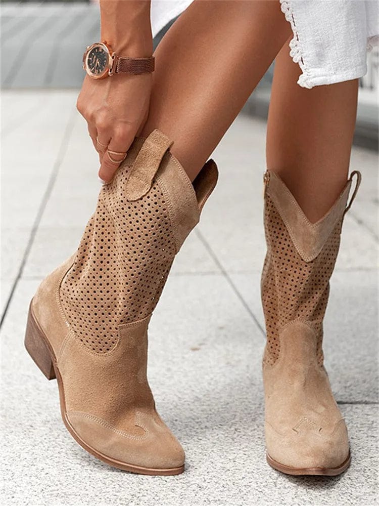 Classic cowgirl ankle boots for women, featuring a durable block heel, easy side zip, & stylish perforated panels.