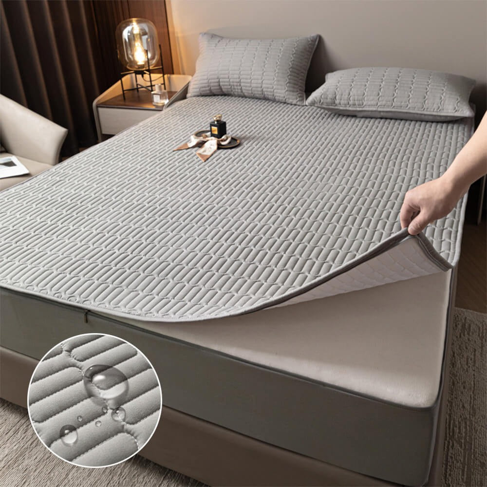 Soft waterproof mattress protector with zippered full enclosure, guarding against spills & allergens for hygienic sleep.