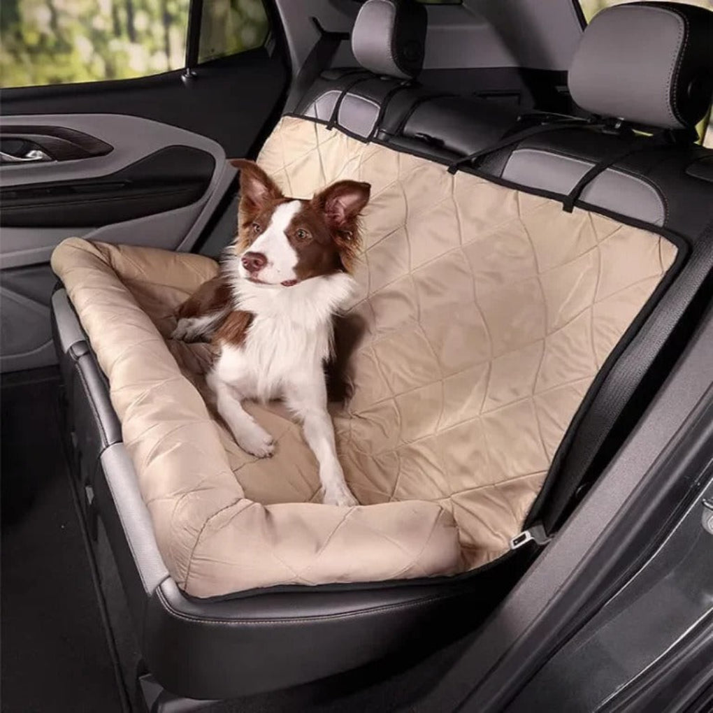Foldable cream dog car seat bed for safe pet travel, keeping your dog secure & car clean. Oxford fabric.
