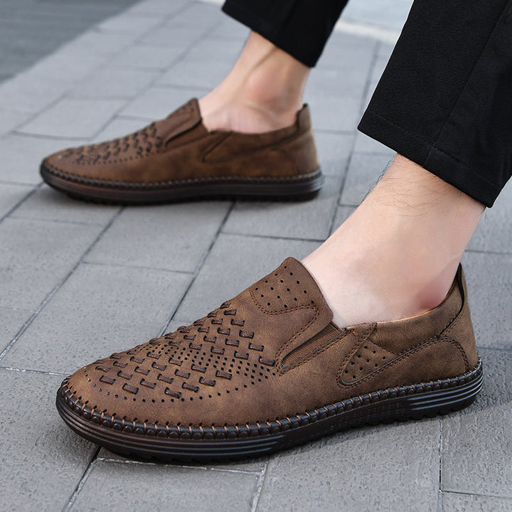 Detailed close-up of the hand-stitched craftsmanship on men's casual comfort loafers.