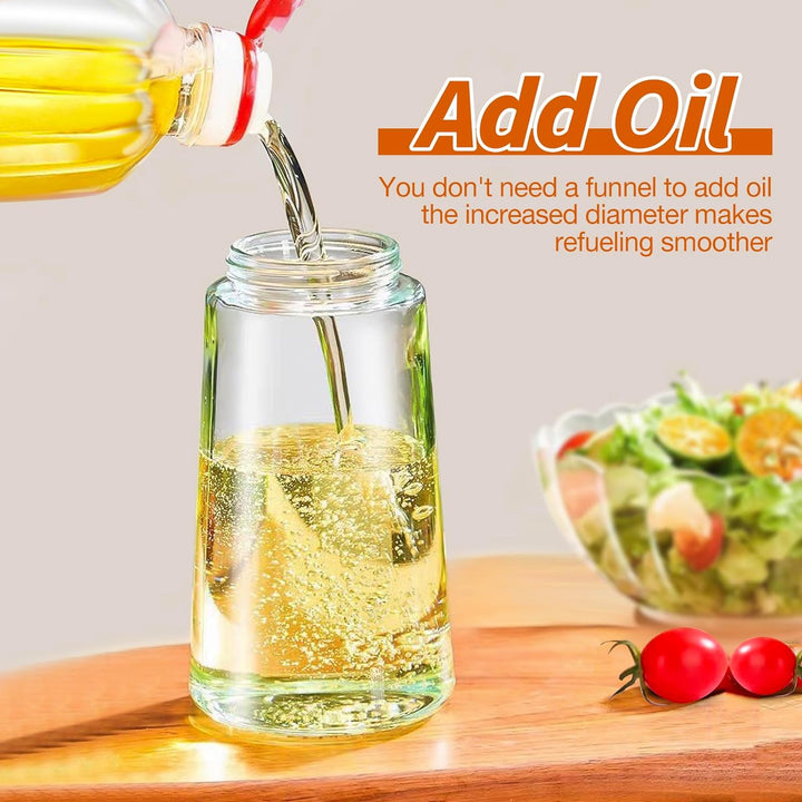 Kitchen dual function oil sprayer & pourer, a stylish glass bottle for all your cooking needs.