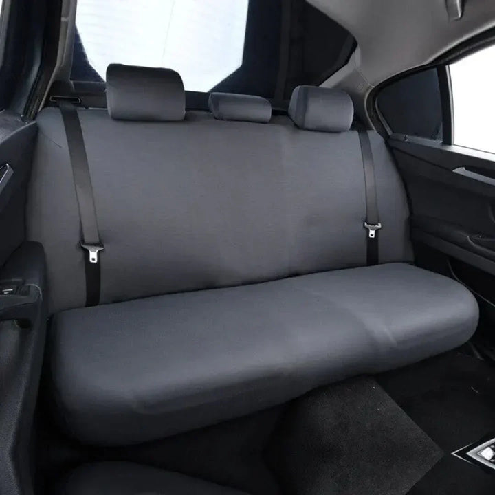 Foldable black car backseat dog hammock cover, showcasing easy storage and portability for pet supplies.