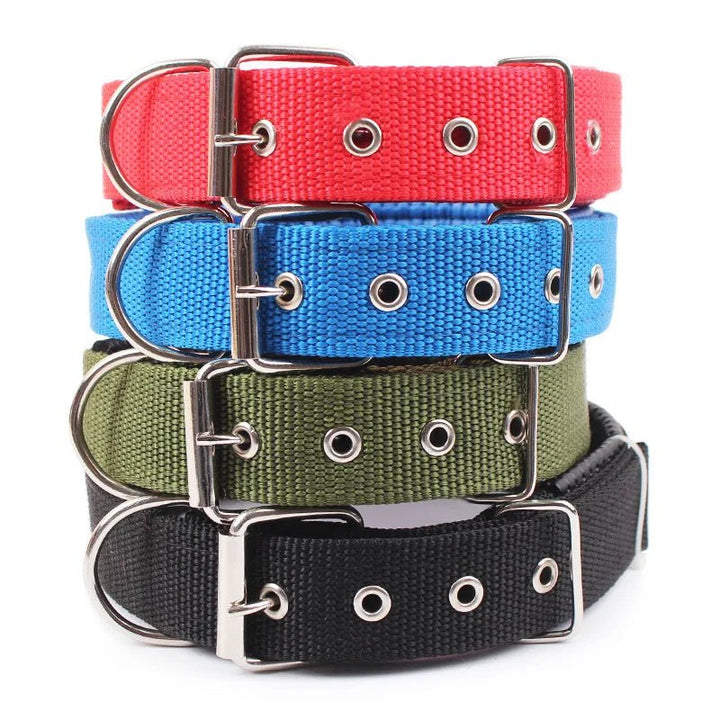 Red adjustable nylon dog collar, strong & comfortable for daily walks; essential pet accessory.