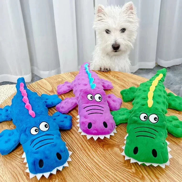 Durable crocodile dog toy, green, with prominent squeaker & chew guard for aggressive chewers.