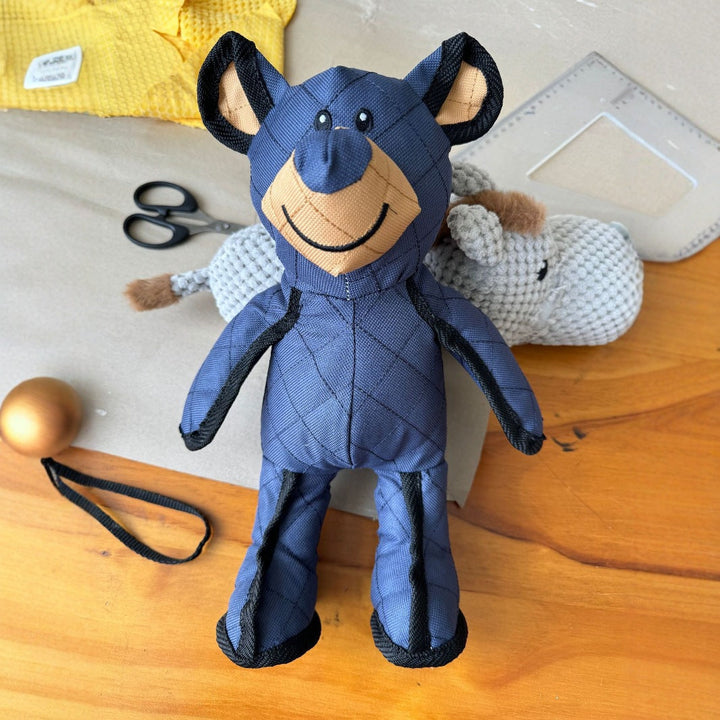 Soft yet durable plush bear dog toy, ideal for playful chewing and comforting cuddles; a fun animal toy.