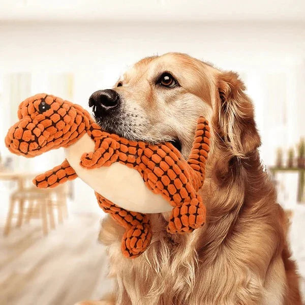 Unisex plush dog toy in vibrant orange, built to withstand heavy chewing