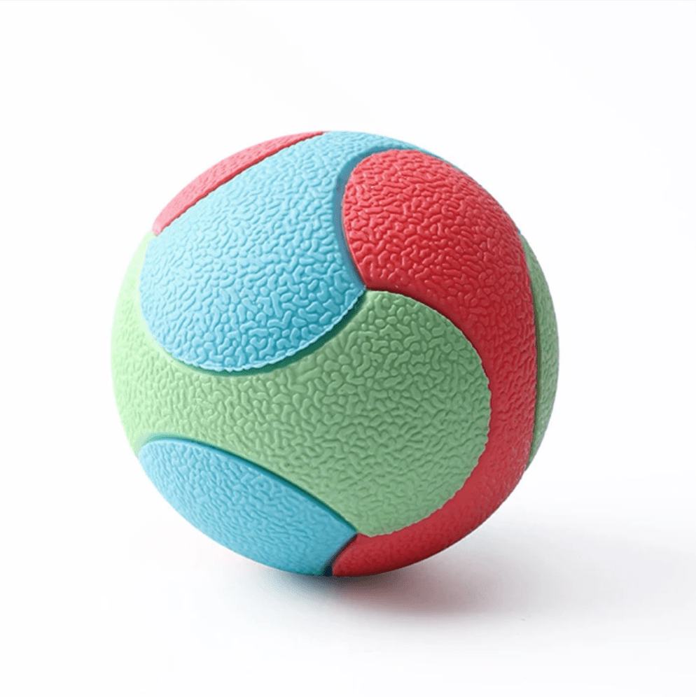 Green durable rubber dog chew ball toy, an essential pet accessory for interactive play and dental hygiene.