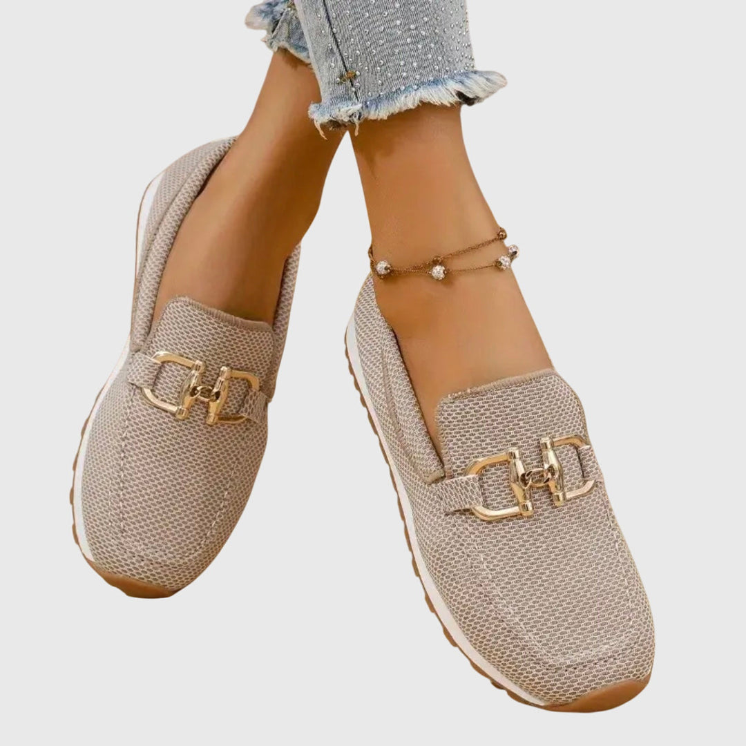 Smooth dusty blue women's loafers with classic horsebit detail, offering polished comfort and style.
