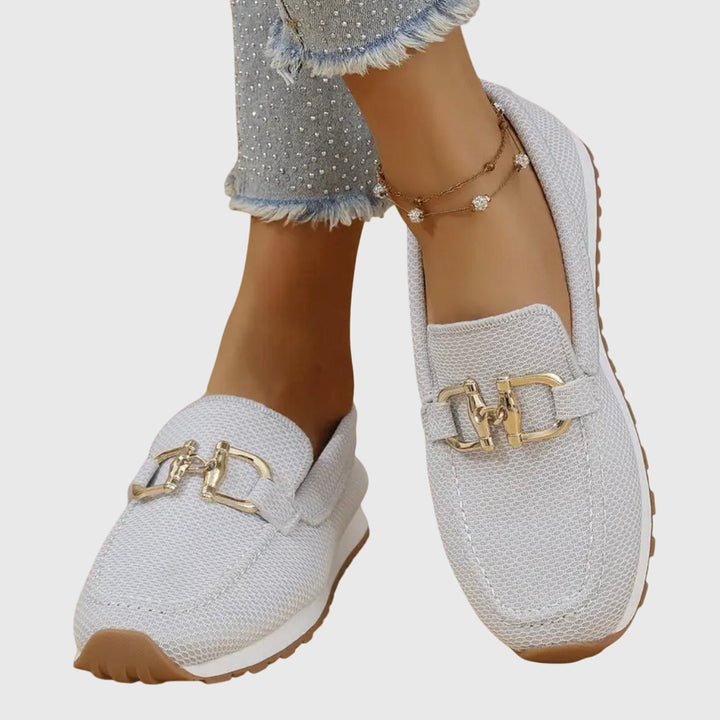Comfortable dusty blue women's horsebit loafers, easy slip-on shoes for casual and elegant fashion.