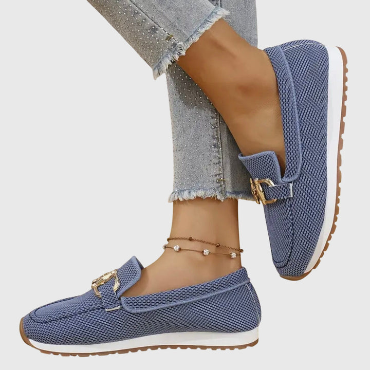 Trendy dusty blue women's horsebit loafers, a preppy and stylish fashion statement for modern women.