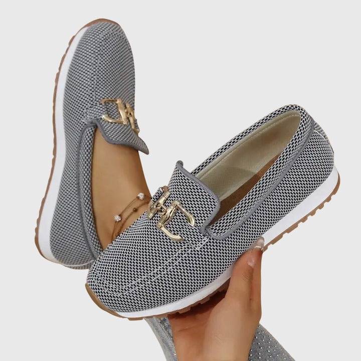 Elegant dusty blue horsebit loafers for women, combining preppy style with ultimate comfort.