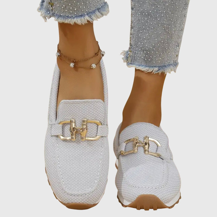 Women's dusty blue slip-on horsebit loafers, practical, comfortable casual footwear for versatile outfits.