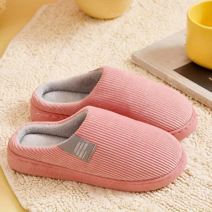 Cozy plush comfort slippers for women, designed as house shoes for ultimate relaxation & foot warmth.