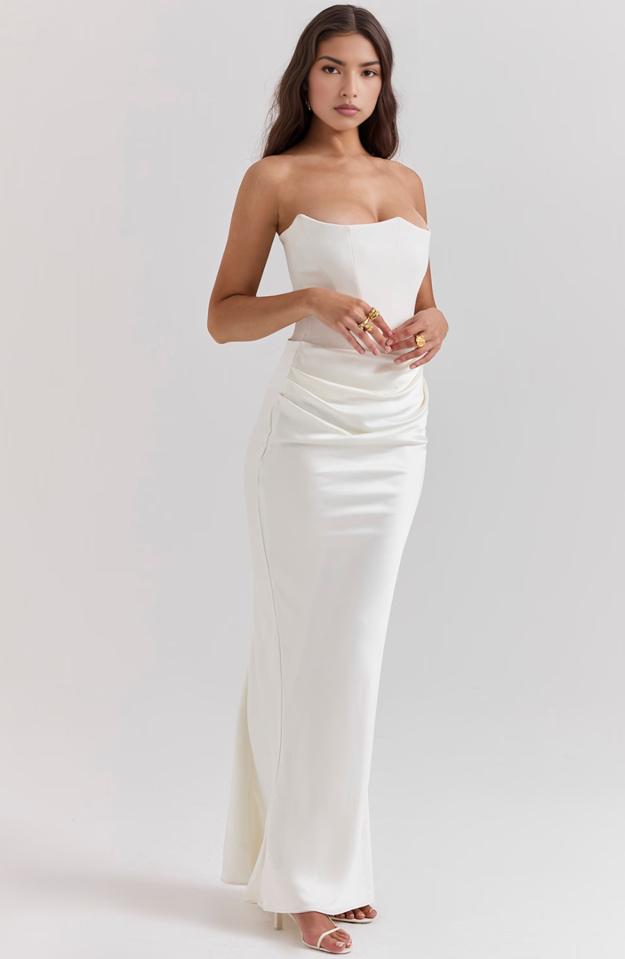 Women's black strapless corset maxi dress. Perfect formal attire for a wedding guest.