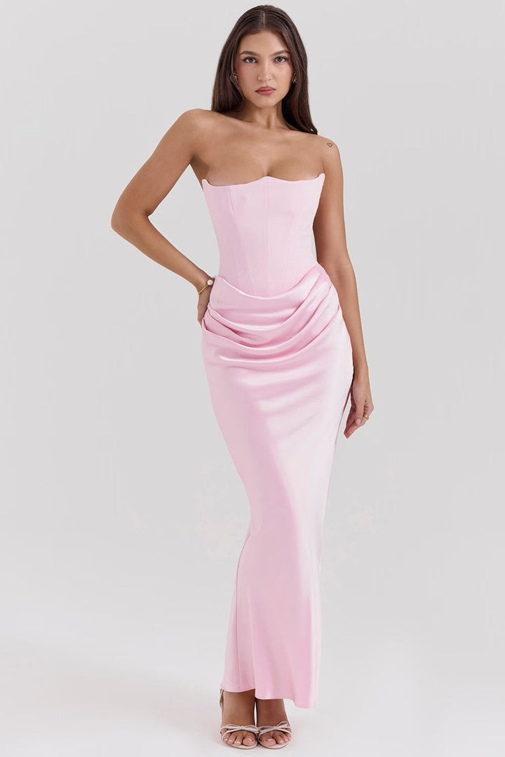 Chic black strapless party dress with a corset bodice. An elegant long gown for women.