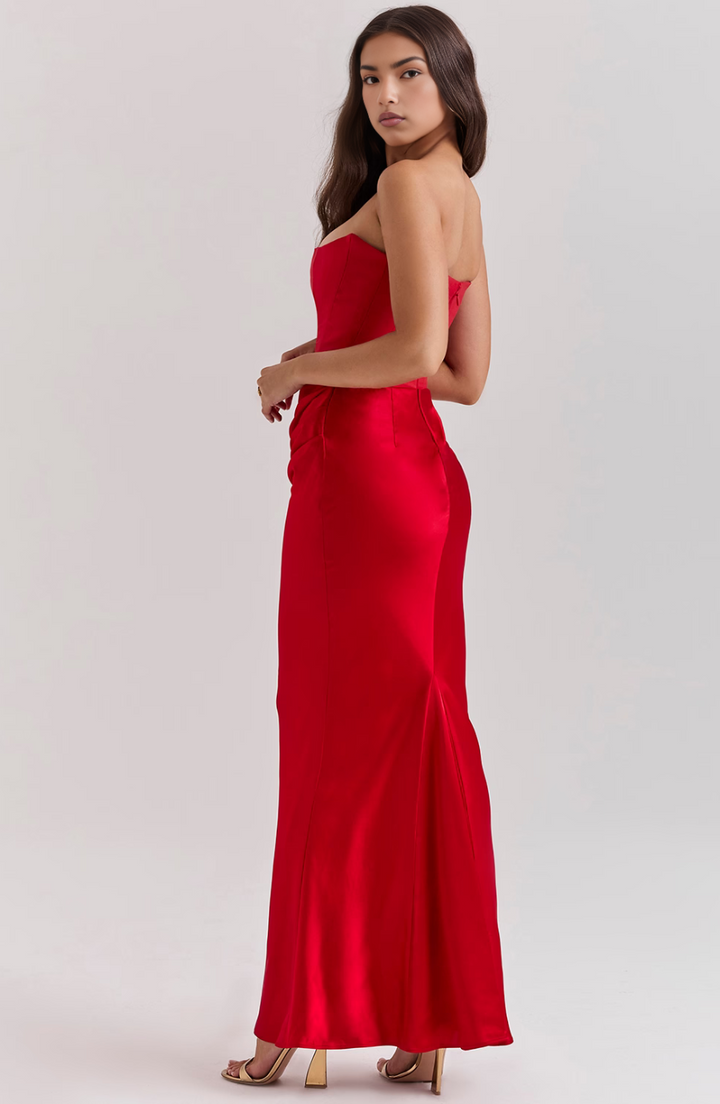 Wedding guest black strapless corset maxi dress. Elegant, formal, and fashionable.