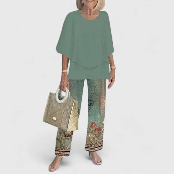 Stylish women's floral wide-leg pants and matching elegant chiffon top.