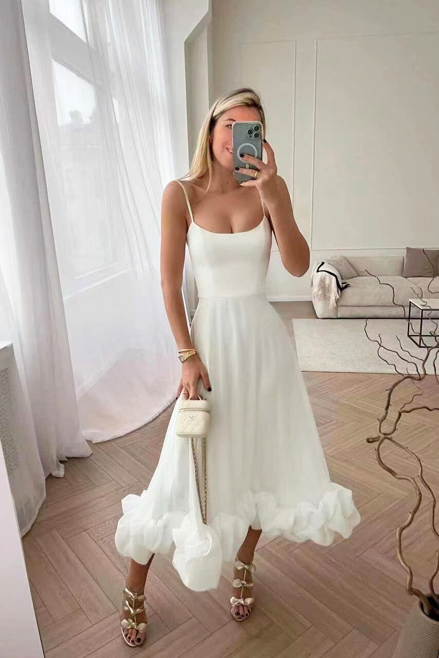 Flowy women's scoop-neck maxi dress, ideal for wedding guests. An elegant party dress or special occasion formal wear.