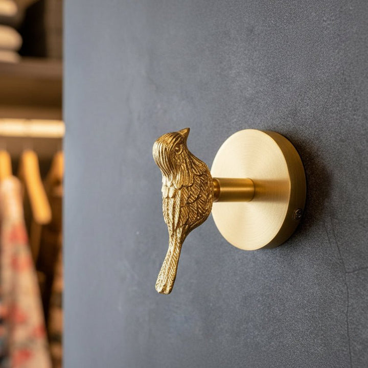 Elegant gold finish animal wall hook, perfect for decorative home accents.