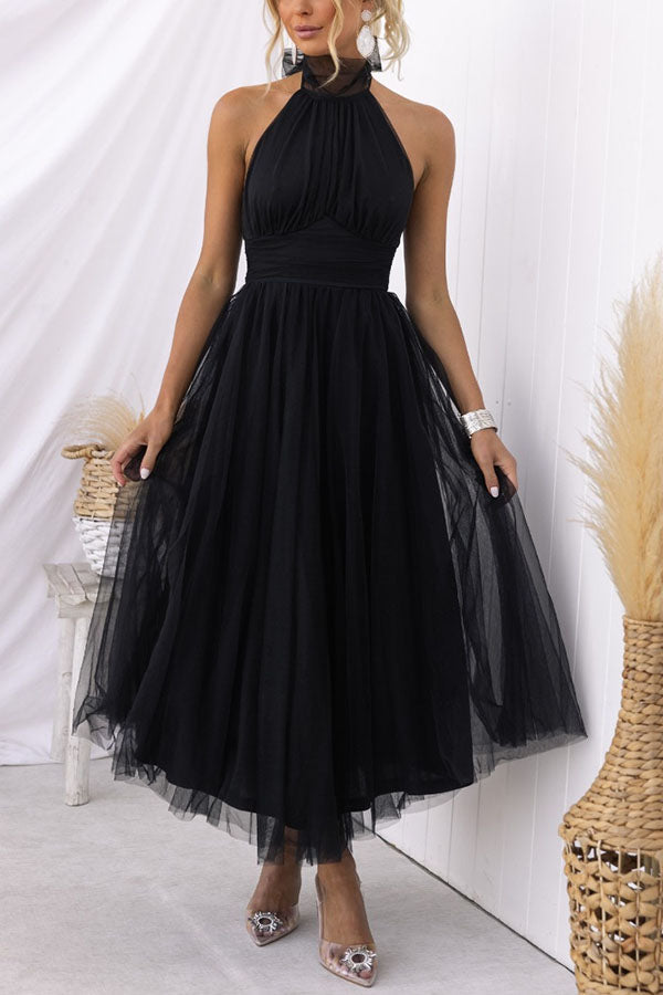 Long elegant halter maxi dress, a stunning formal gown for women's special occasions and evening wear.