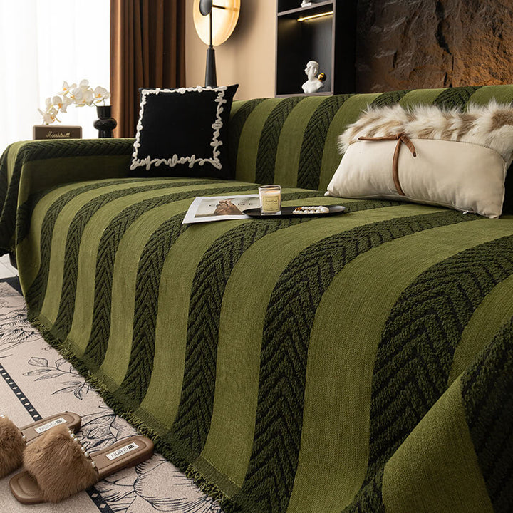 Elegant herringbone chenille sofa cover in a light neutral, enhancing living room decor and pet friendly.