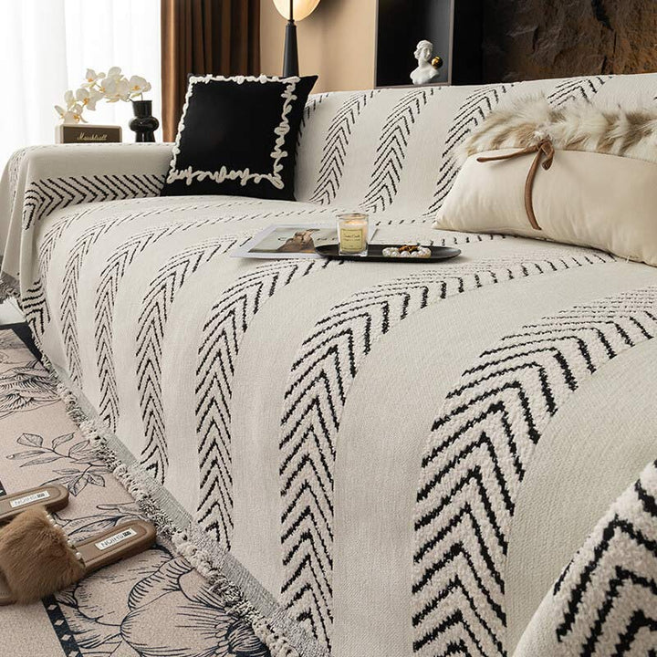 Stylish herringbone chenille sofa protector, designed for comfort and everyday living room use.
