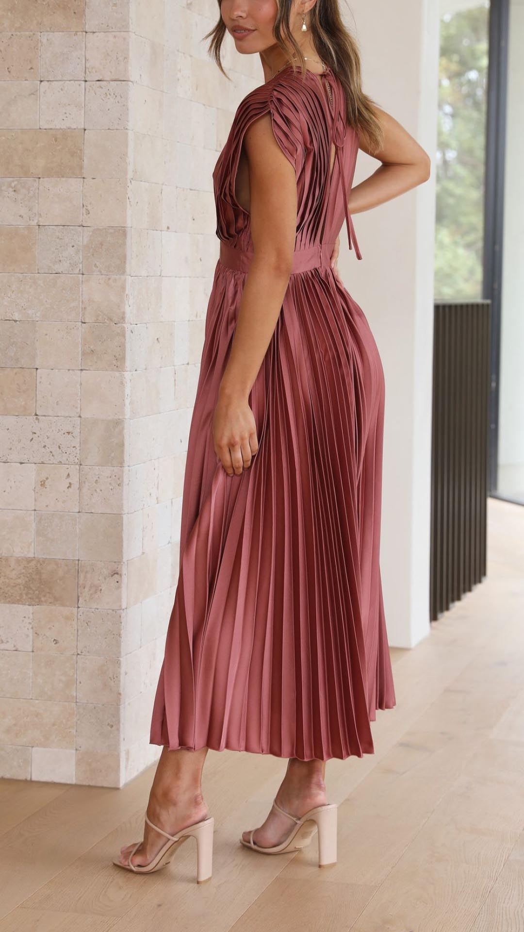 Flowy pleated V-neck midi wedding guest dress, comfortable and elegant for women.