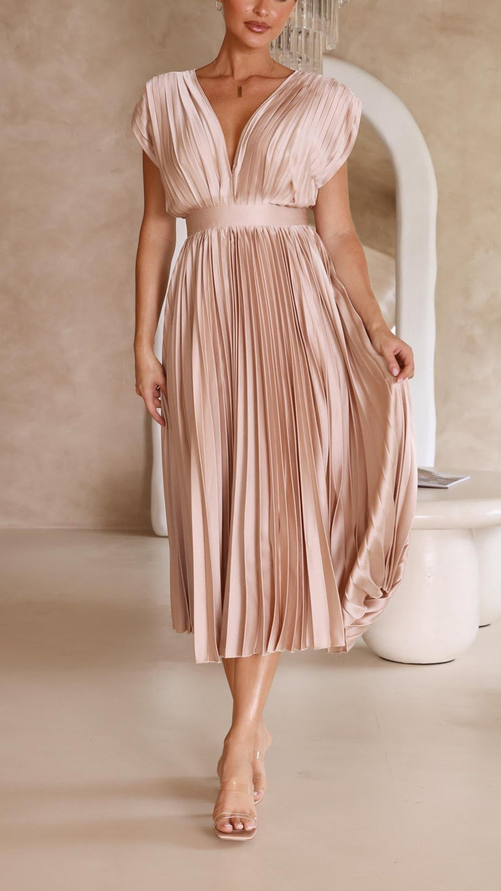 Women's elegant midi dress with pleats and V-neck, suitable for wedding guests.