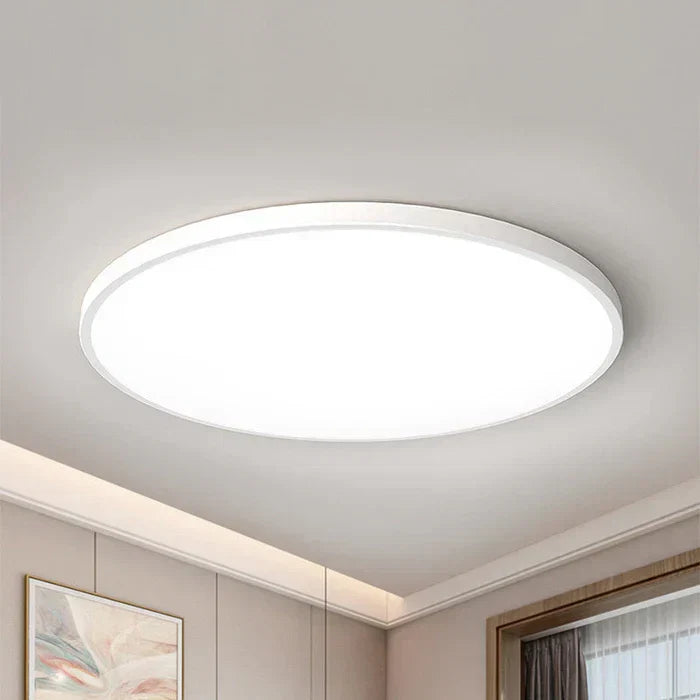 Adjustable LED ceiling light, OrbGlow round fixture for dining rooms.