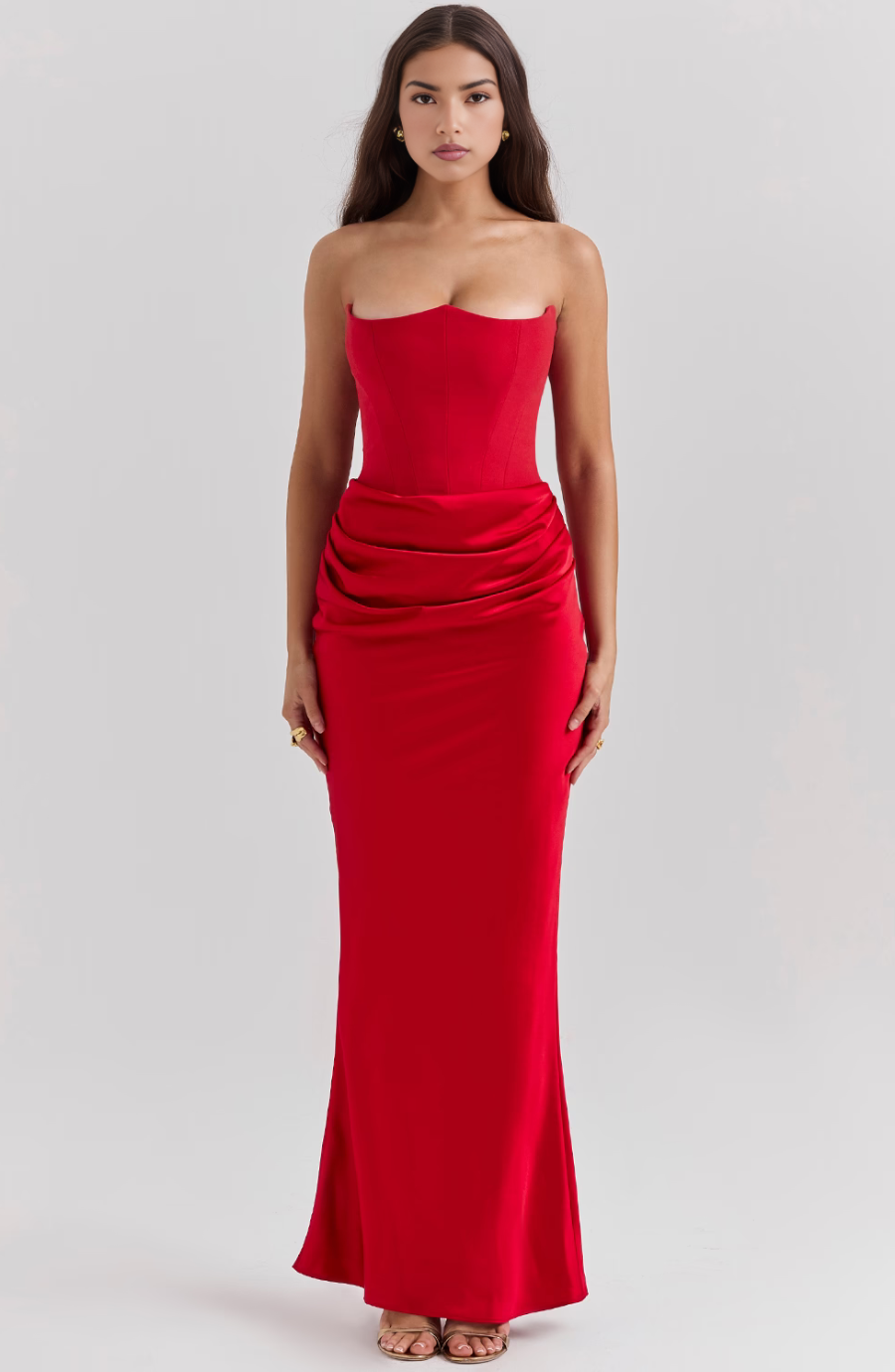 Detailed shot of the sweetheart neckline on a women's strapless homecoming gown.