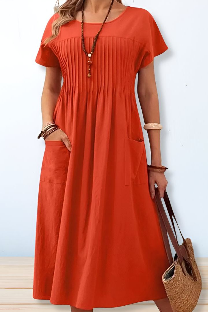 Classic women's A-line midi dress. Versatile, elegant, and machine washable for easy everyday style.