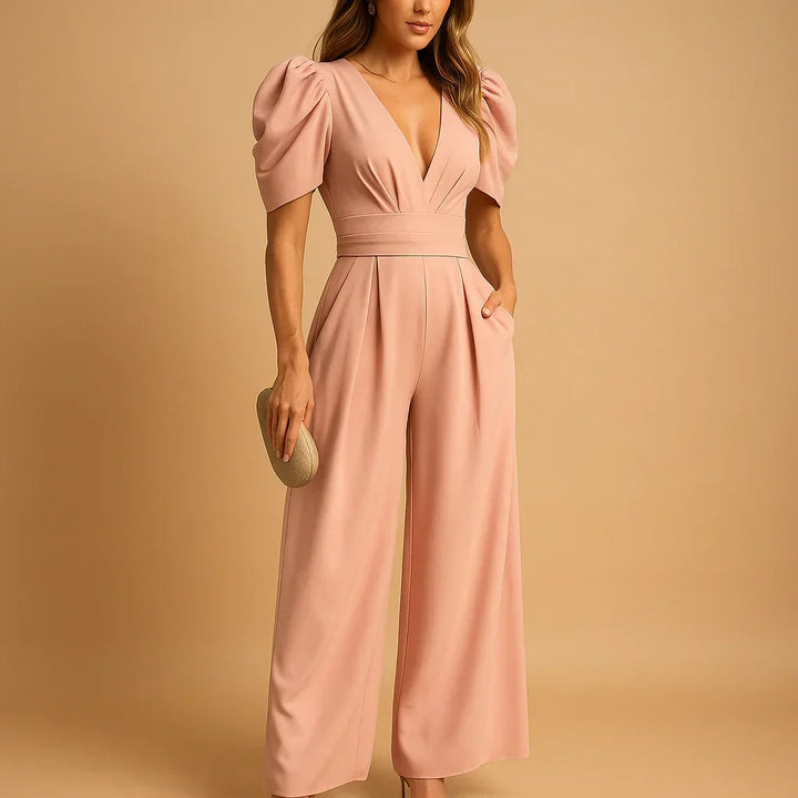 Elegant women's black formal jumpsuit with stylish puff sleeves, perfect for evening wear & special occasions.