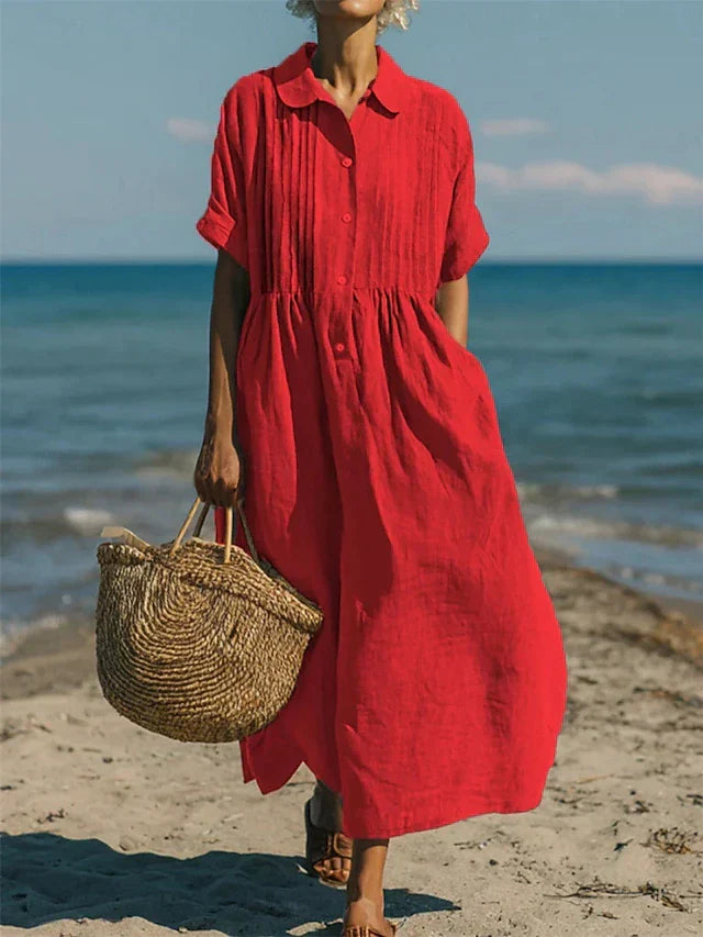 Versatile button-front day dress for women, offering an elegant yet casual spring fashion look.