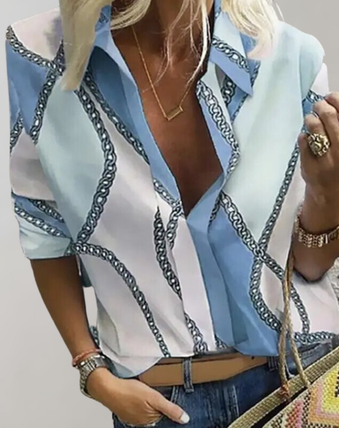 Sophisticated women's chain print blouse. Fashionable long sleeve top, perfect for elegant office wear & evening events.