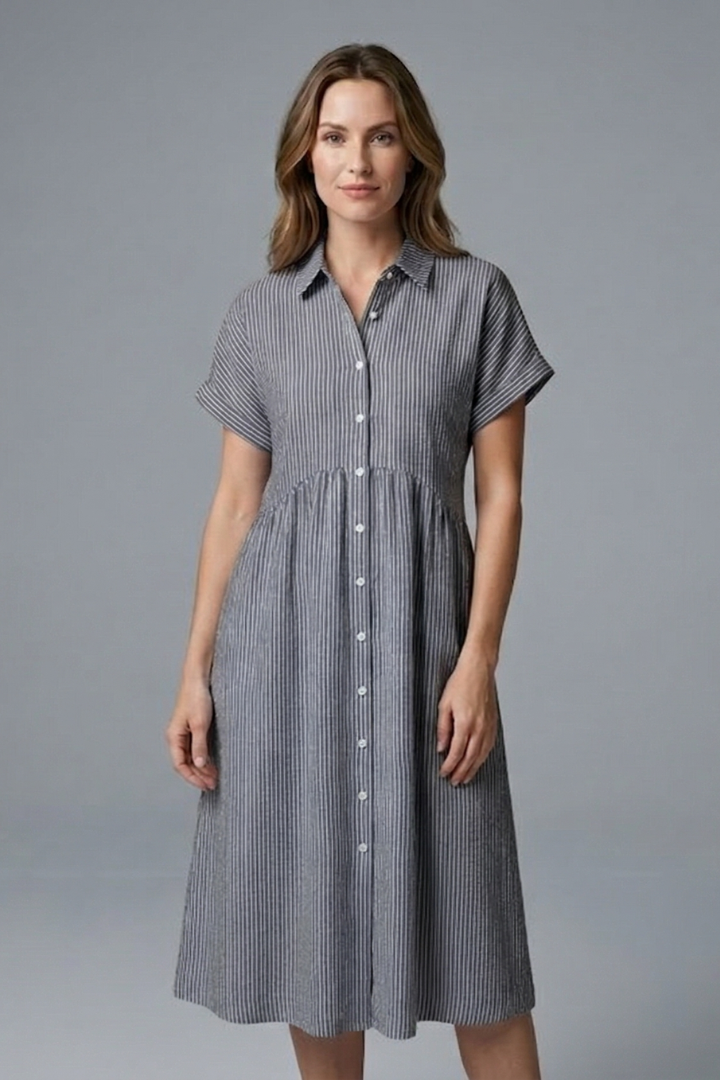 Modern women's apparel: a collared button-front midi dress, offering elegant, versatile, and chic style.