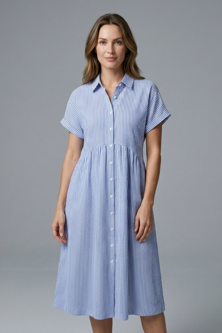 Chic women's collared midi dress with full button front, suitable for workwear or casual day dress.