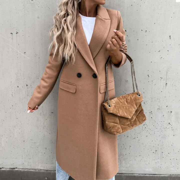 Elegant women's double-breasted long coat with large lapel, ideal for chic formal and workwear trench style.
