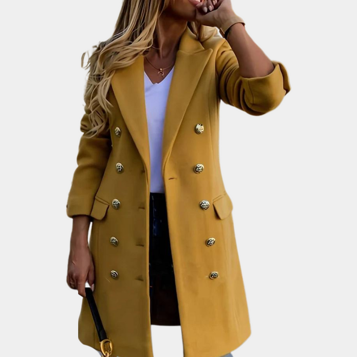 Elegant women's double-breasted trench coat with a cinched waist, perfect classic workwear for fall.