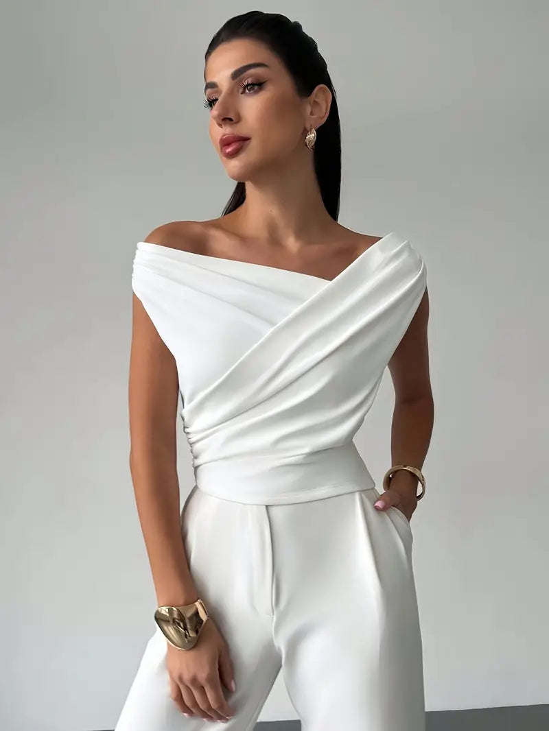 Elegant women's draped shoulder top, perfect for evening wear or sophisticated occasions.