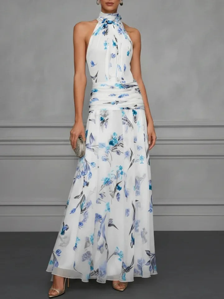 Long floral halter maxi dress for women. Elegant, sleeveless, and a-line design for casual or formal summer events.