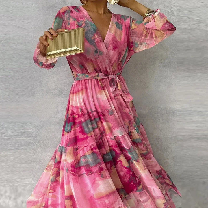 Flowing long floral maxi dress for women, elegant classic style ideal for summer & occasion wear.