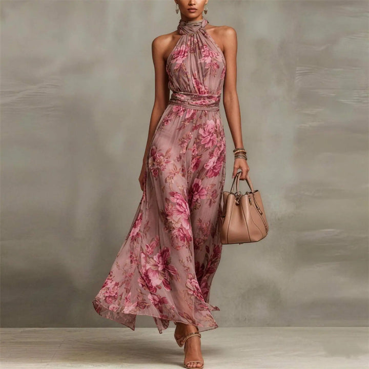 Elegant women's floral maxi dress with halter neck & ruched waist, perfect for wedding guests or parties.