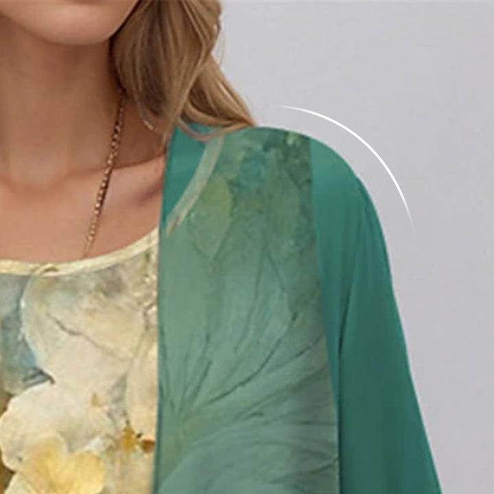 Graceful floral midi dress and complementary cardigan set. Women's elegant two-piece for chic spring fashion.