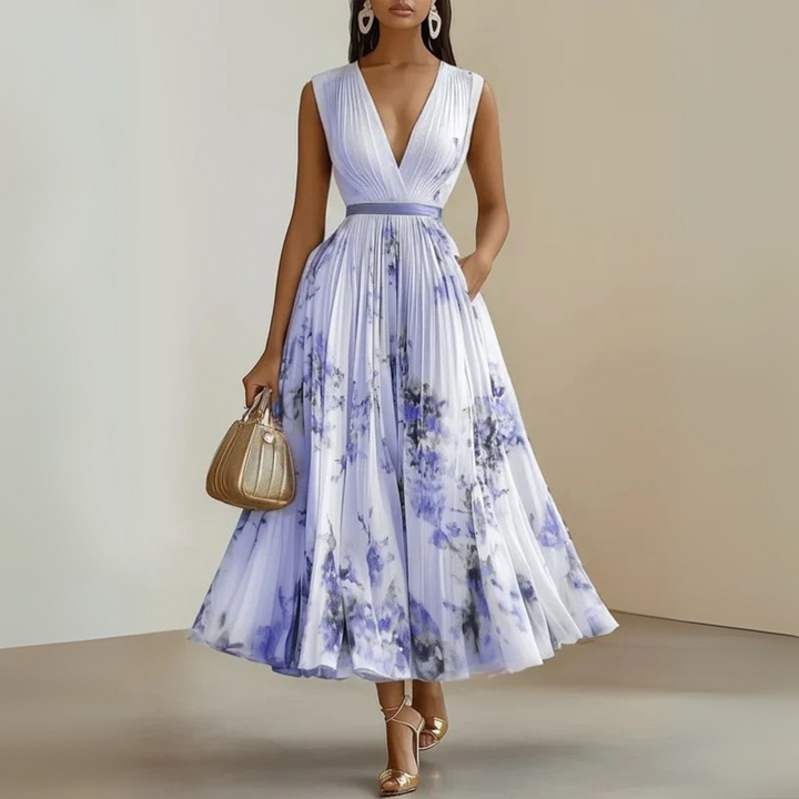 Chic women's pleated midi dress with a floral pattern and V-neck, elegant for parties.