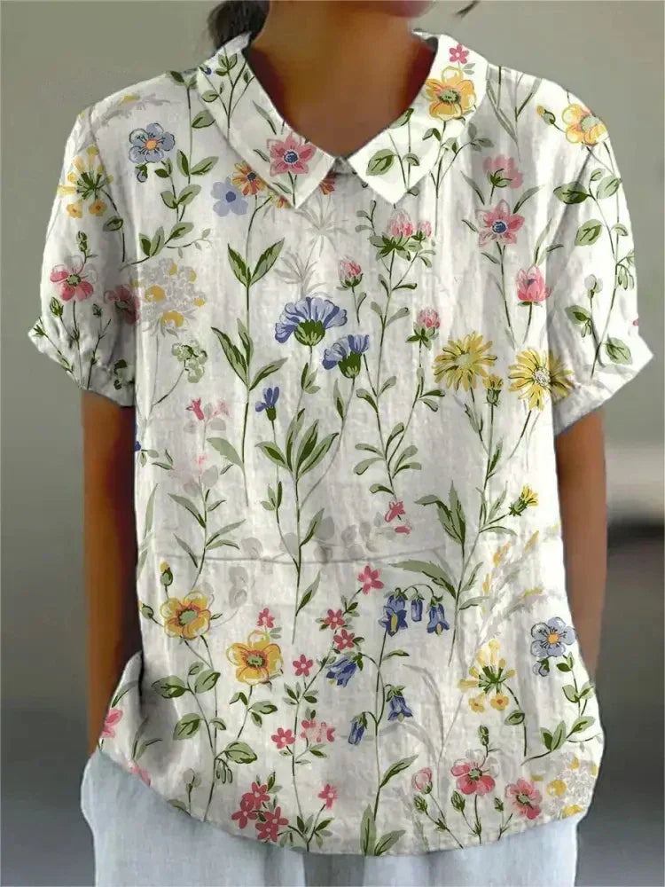 Casual women's floral print shirt with long sleeves, ideal for comfortable everyday wear and effortless style.