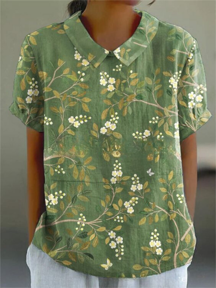 Effortless spring floral print top for women, a stylish long sleeve blouse for versatile everyday wear.