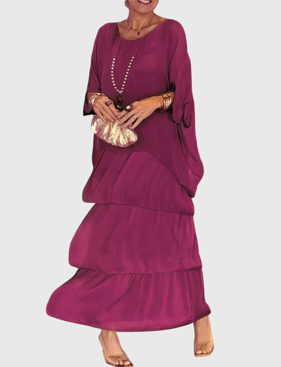 Sophisticated women's long dress, collared, button-up, flowing, ideal for formal or wedding guest.