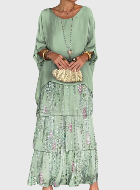 Collared half-sleeve women's maxi dress, button-up, elegant & flowing, ideal for formal events.